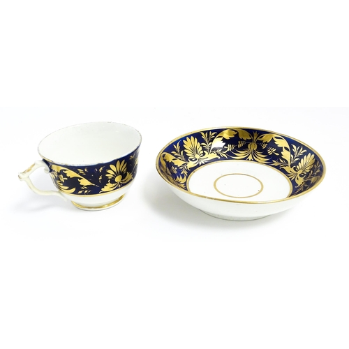 146 - A quantity of Derby tea wares decorated in the Imari pattern to include cups, saucers, plates, etc. ... 