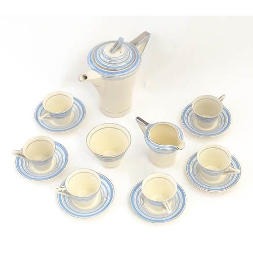 149 - An Art Deco Solian Ware coffee wares to include coffee pot, sugar bowl, milk jug, cups and saucers. ... 