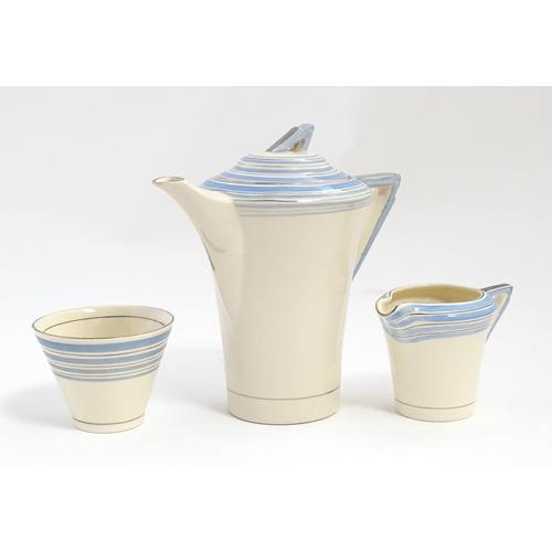 149 - An Art Deco Solian Ware coffee wares to include coffee pot, sugar bowl, milk jug, cups and saucers. ... 