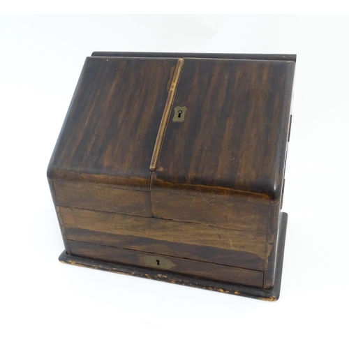 1245 - A late 19th / early 20thC slope front stationery / correspondence box opening to reveal a fitted int... 