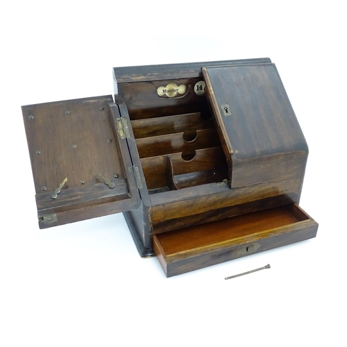 1245 - A late 19th / early 20thC slope front stationery / correspondence box opening to reveal a fitted int... 