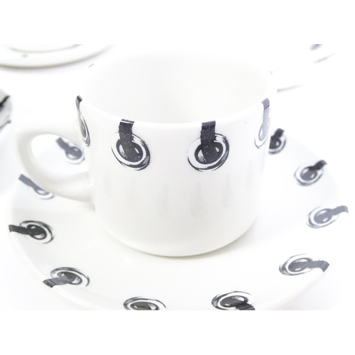 220 - A quantity of Dr Martens Air Wair dinner and tea wares with eyelet detail to include plates, bowls, ... 