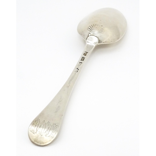 529 - A Geo II silver table spoon hallmarked London 1746, maker Samuel Roby. Approx. 8