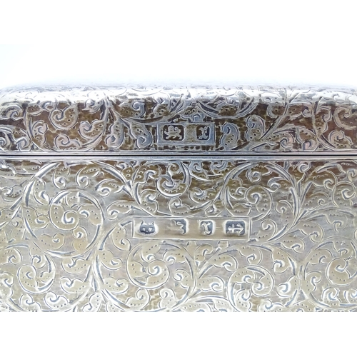 530 - A Victorian silver table top cigarette box with engraved acanthus scroll decoration and wood lined i... 