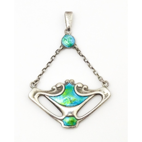 625 - An Art Nouveau silver pendant with enamel decoration, hallmarked Chester 1909, maker Charles Horner.... 