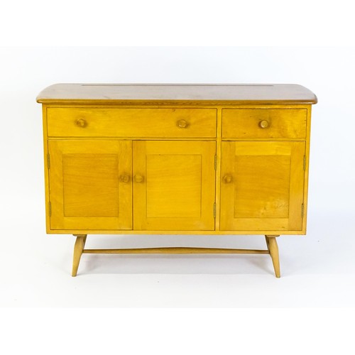 1630 - Vintage / Retro: An Ercol elm sideboard, model 351. The figured elm top above a single long drawer, ... 