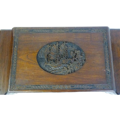 1520 - A 20thC oriental camphor wood trunk, with a carved front and sides, the carving depicting sail ships... 