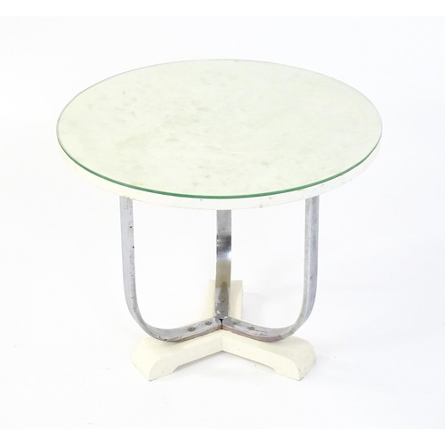 1635 - Mid Century / Modern - A coffee table with a circular top raised on three chromed supports and a tri... 