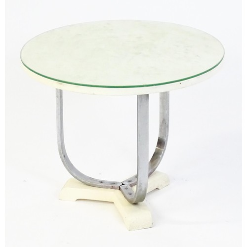 1635 - Mid Century / Modern - A coffee table with a circular top raised on three chromed supports and a tri... 