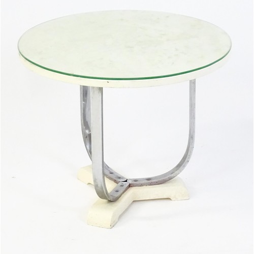 1635 - Mid Century / Modern - A coffee table with a circular top raised on three chromed supports and a tri... 