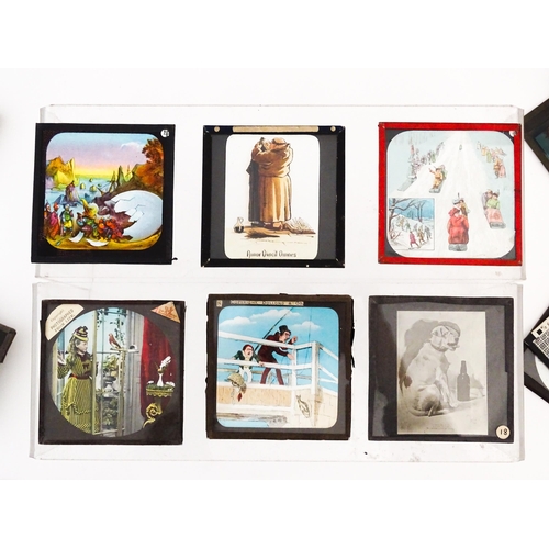 1244 - A large quantity of assorted 19thC and later magic lantern slides to include a caricature of King Ge... 