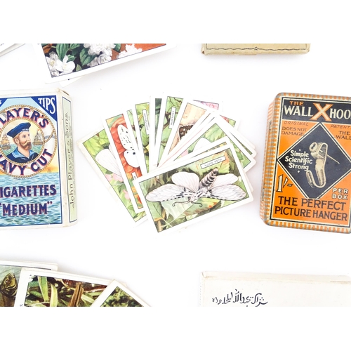 1944 - A quantity of cigarette cards in albums and loose, series to include Players: Birds & Their Young, A... 