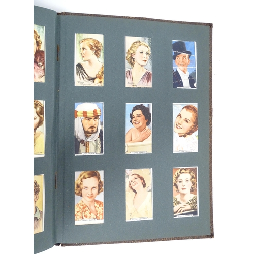 1944 - A quantity of cigarette cards in albums and loose, series to include Players: Birds & Their Young, A... 