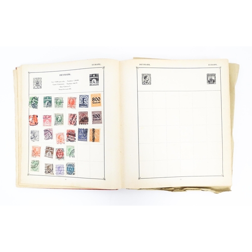 1951 - A Strand stamp album to include 19thC and later worldwide postage stamps, including George V Hong Ko... 