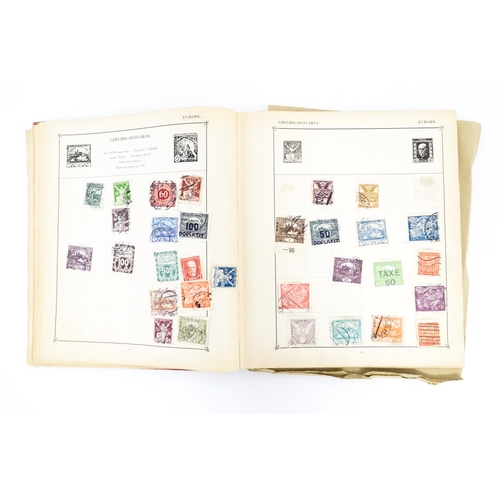 1951 - A Strand stamp album to include 19thC and later worldwide postage stamps, including George V Hong Ko... 