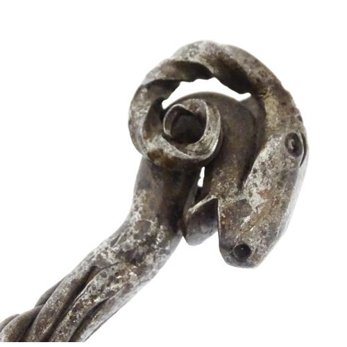 1303A - Two blacksmith made fire tools in the manner of Aaron Petersen with twist handle and rams head finia... 