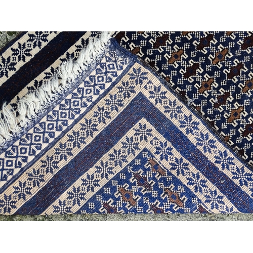 1346 - Carpet / Rug : A blue ground runner with repeating geometric motifs and cream ground borders  Approx... 