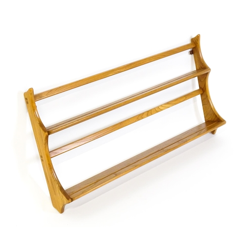 1634 - Vintage / Retro: An elm Ercol two tier plate rack. 38 wide x 20