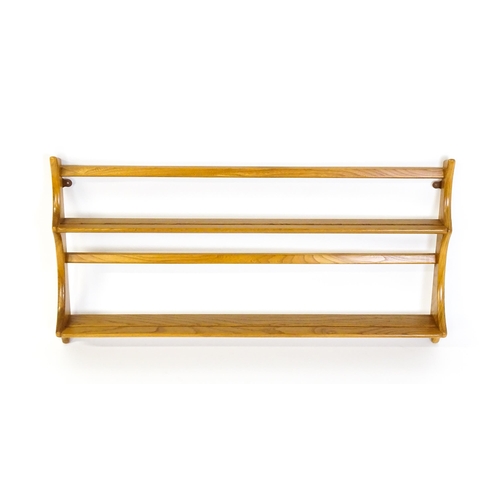 1634 - Vintage / Retro: An elm Ercol two tier plate rack. 38 wide x 20