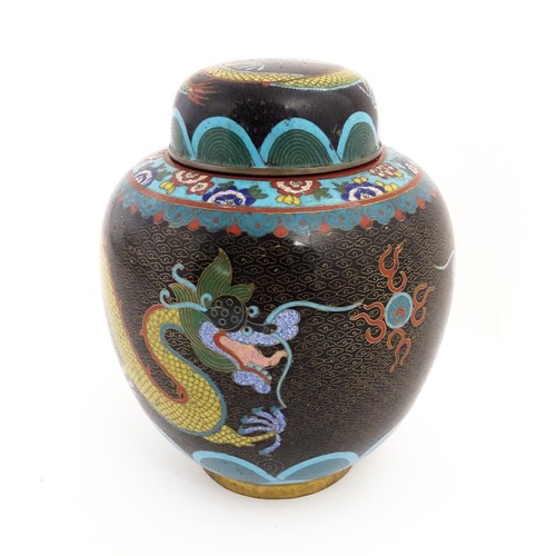 1057 - A Chinese cloisonne ginger jar with a black ground decorated with dragons and a flaming pearl. Toget... 