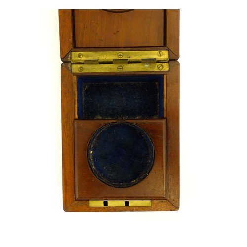 1102 - A 19thC three tier mahogany travelling pocket watch case. Approx. 2 1/4