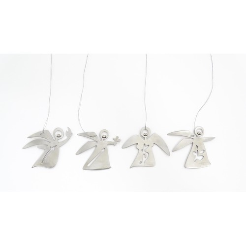 1106 - A set of four Danish Georg Jensen Christmas decorations of angel form comprising the four archangels... 