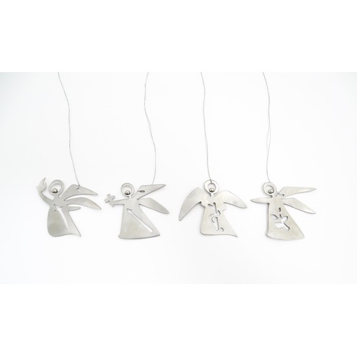 1106 - A set of four Danish Georg Jensen Christmas decorations of angel form comprising the four archangels... 