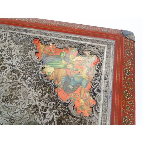 1114 - A Persian photograph album with lacquered boards decorated with a hand painted panel depicting a cou... 