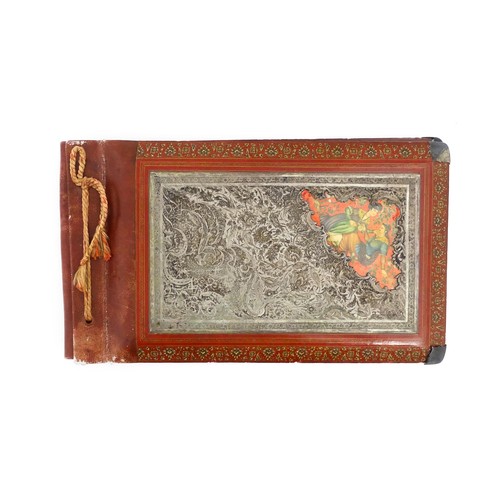 1114 - A Persian photograph album with lacquered boards decorated with a hand painted panel depicting a cou... 