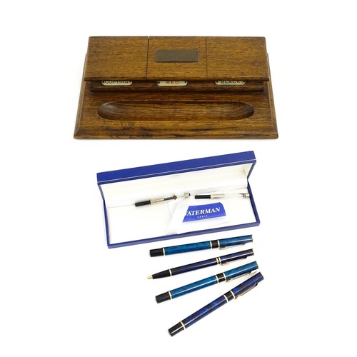 1160 - A cased Waterman fountain pen and ball point pen. Together with another Waterman fountain pen and ba... 