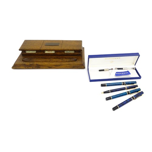 1160 - A cased Waterman fountain pen and ball point pen. Together with another Waterman fountain pen and ba... 