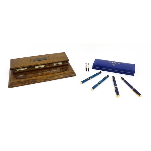 1160 - A cased Waterman fountain pen and ball point pen. Together with another Waterman fountain pen and ba... 