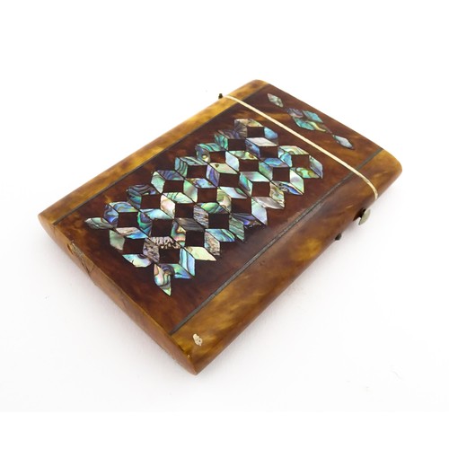 1187 - A Victorian tortoiseshell card case of rectangular form with inlaid abalone geometric decoration. Ap... 