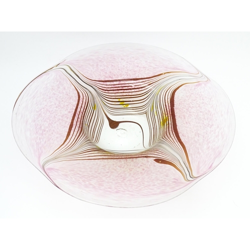 227 - A George Elliott of Bewdley (1933-1988) art glass dish with linear detail on a mottled pink ground. ... 