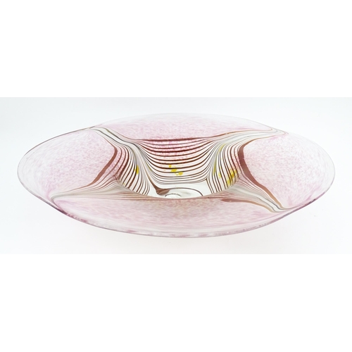 227 - A George Elliott of Bewdley (1933-1988) art glass dish with linear detail on a mottled pink ground. ... 