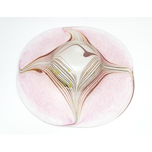 227 - A George Elliott of Bewdley (1933-1988) art glass dish with linear detail on a mottled pink ground. ... 