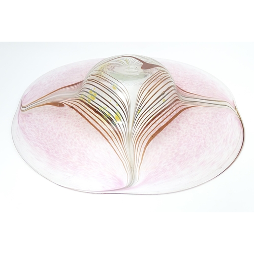 227 - A George Elliott of Bewdley (1933-1988) art glass dish with linear detail on a mottled pink ground. ... 