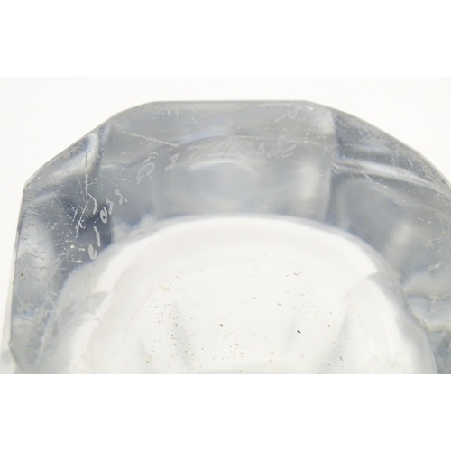 228 - Scandinavian art glass: An Orrefors glass vase with etched girl and butterfly detail. Signed under. ... 