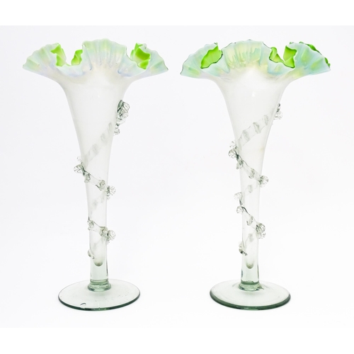 230 - A pair of art glass vases with flared rims and prunt detail. Approx. 10 1/4