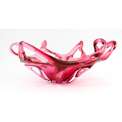 231 - A retro 20thC pink art glass centrepiece with looped edge in the manner of Josef Hospodka for Chribs... 