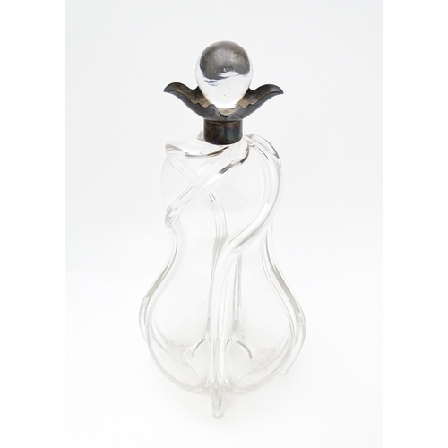 249 - A Victorian shaped glass decanter with trail detail, with silver collar hallmarked London 1896, make... 