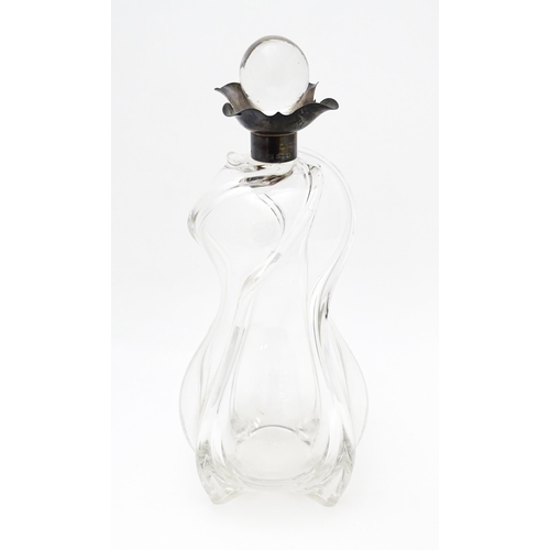 249 - A Victorian shaped glass decanter with trail detail, with silver collar hallmarked London 1896, make... 