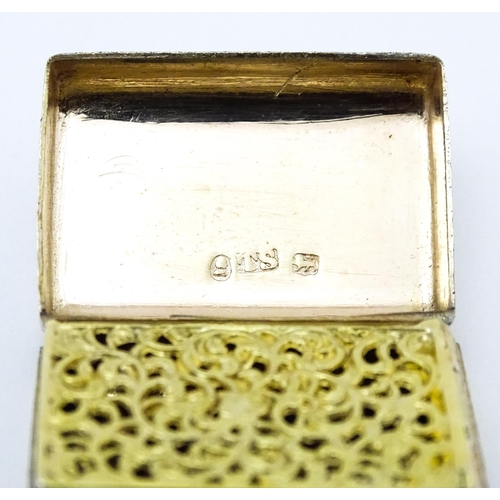 380 - A silver vinaigrette of purse form with engraved floral detail and gilded interior   hallmarked Birm... 