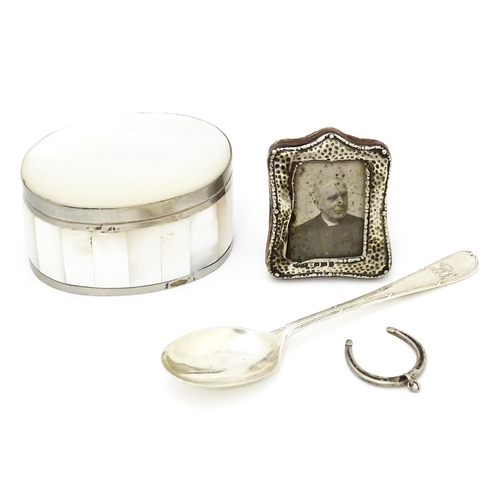 494 - Assorted items to include a miniature photograph frame with silver surround having hammered decorati... 