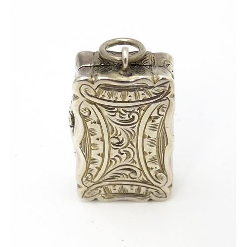 507 - A small Victorian silver vinaigrette with engraved decoration and gilded interior, hallmarked Birmin... 