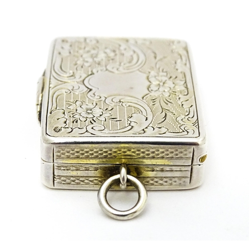 523 - A Victorian silver vinaigrette with engraved floral decoration hallmarked Birmingham 1857, maker Ast... 