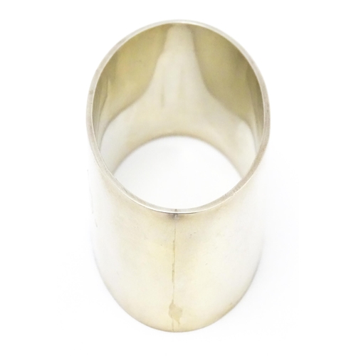 526 - A silver napkin ring of oval form, hallmarked Birmingham 1942, maker J B Chatterley & Sons Ltd.