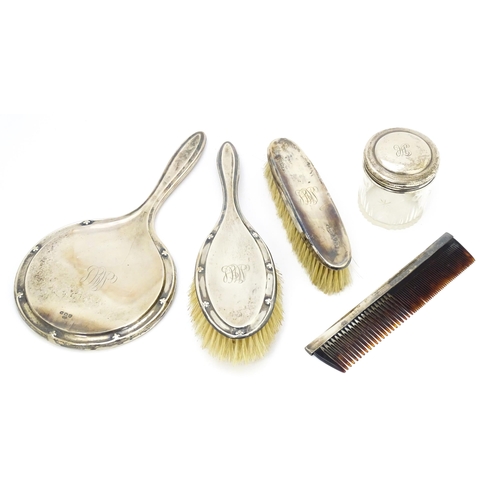 538 - Assorted dressing table items comprising silver backed hand mirror, brush and comb hallmarked Birmin... 