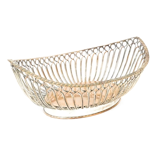 559 - A 19thC silver plate bread basket with open work detail. 11