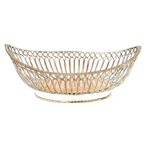 559 - A 19thC silver plate bread basket with open work detail. 11